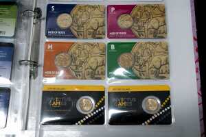 Group of collectable $1 and $2 coins - 5