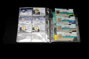 Group of collectable $2, $1, and 50c coins