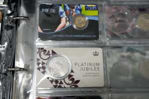 Group of collectable $2, $1, and 50c coins - 4