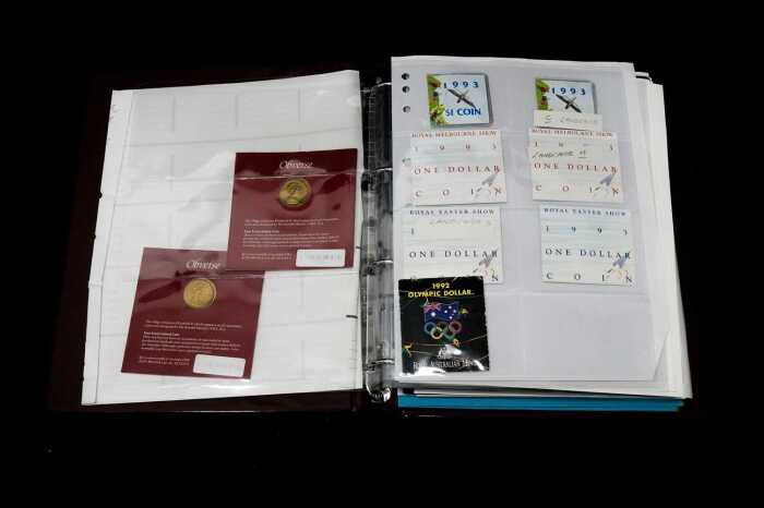 Album of collectable $1 coins