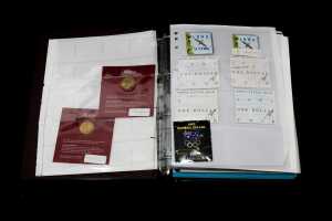 Album of collectable $1 coins