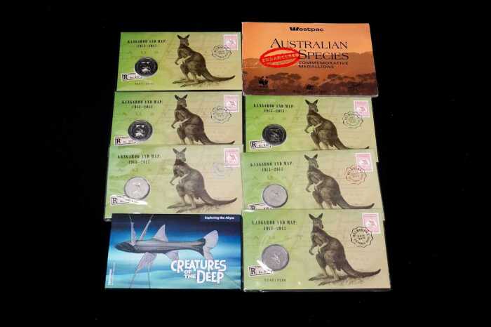 Eight assorted collectable coins and PNCs
