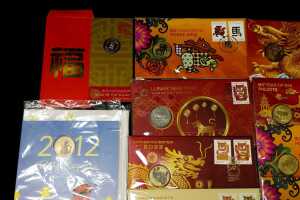 Group of Lunar New Year themed collectable coins and PNCs - 2