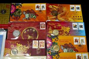 Group of Lunar New Year themed collectable coins and PNCs - 3
