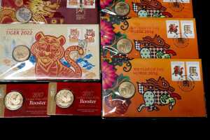 Group of Lunar New Year themed collectable coins and PNCs - 5