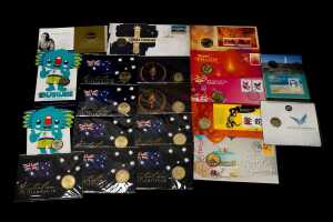 Group of assorted multi-cultural themed collectable coins and PNCs