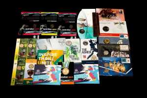 Group of assorted sporting themed collectable coins and PNCs