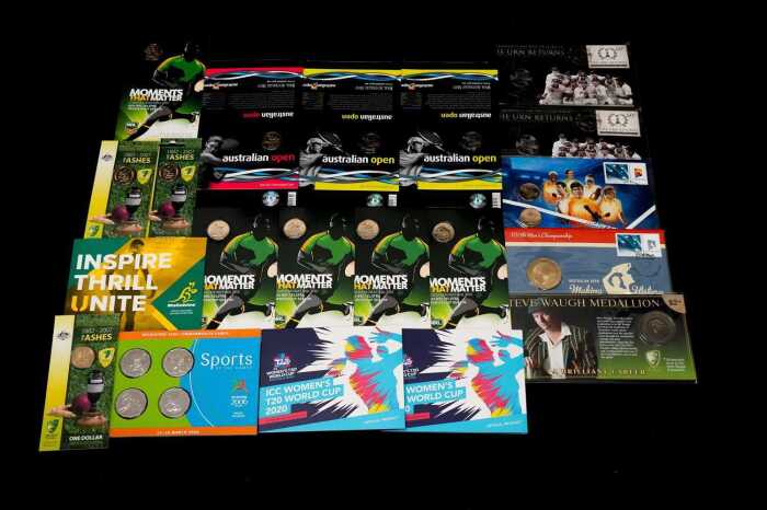 Group of assorted sporting themed collectable coins and PNCs