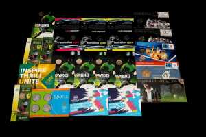 Group of assorted sporting themed collectable coins and PNCs