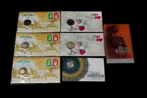Seven assorted collectable coins and PNCs