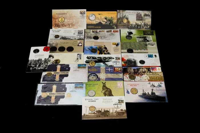 Group of assorted historical and remembrance themed collectable coins and PNCs