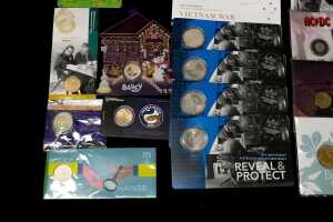 A group of uncirculated collectable coins and Philatelic Numismatic cards (PNCs) - 4
