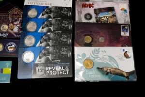 A group of uncirculated collectable coins and Philatelic Numismatic cards (PNCs) - 5
