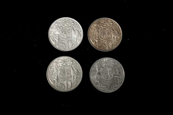 Four Australian round silver 50c coins