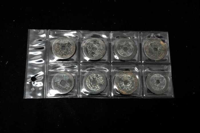 A set of eight Chinese coins