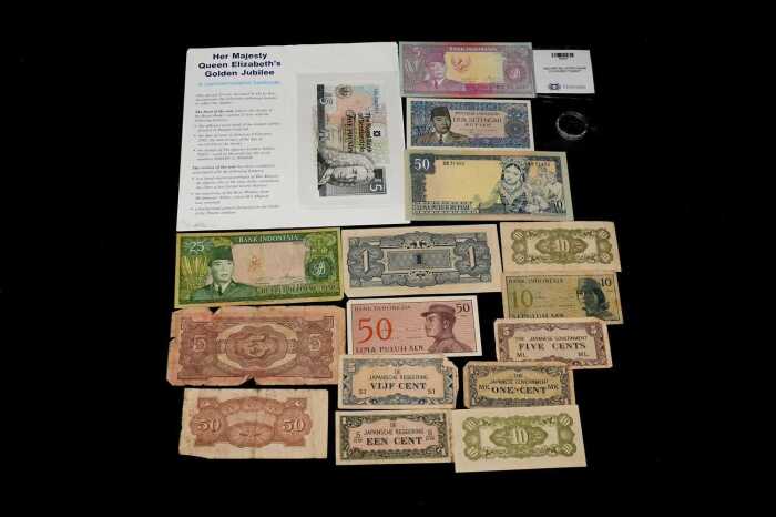 Group of international banknotes and coins