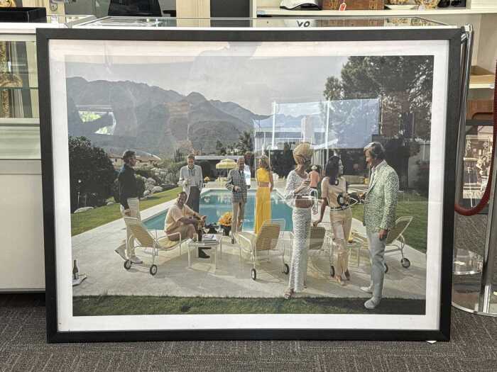After Slim Aarons, Palm Springs Party. Framed reproduction print on paper