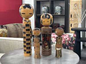 Four Japanese Kokeshi dolls