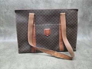 Designer-style brown and tan coated canvas shoulder tote bag