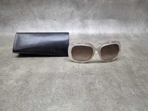 69 · Designer-style opalescent sunglasses