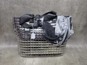 Designer-style silver tone handbag with floral lining