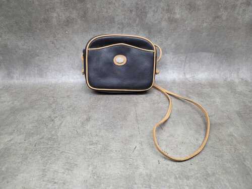 Designer-style black and tan leather crossbody bag