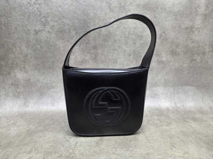 Designer-style black interlocking shoulder bag