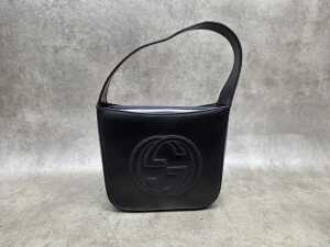 Designer-style black interlocking shoulder bag