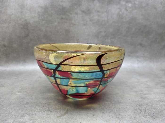 Murano-style glass bowl with controlled gold-tone inclusions