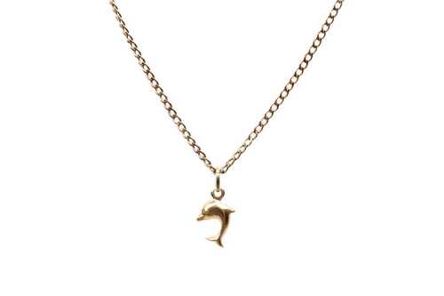 A dolphin pendant on curb link necklace in 9 carat yellow gold