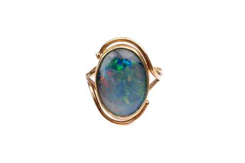 A damaged opal triplet ring in 9 carat yellow gold
