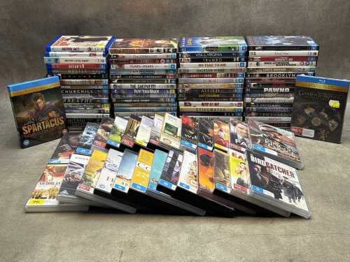 DVDs and Blu-rays, mostly movies, including Barbie
