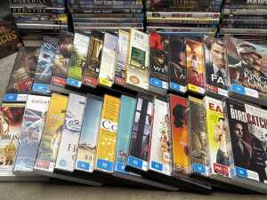 DVDs and Blu-rays, mostly movies, including Barbie - 2