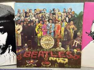 Five vinyl records, including The Beatles - 3