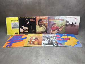 Nine vinyl records, including 50s/60s and Jazz
