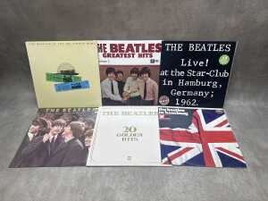 Six Beatles vinyl records, including 'Greatest Hits: Volume 1' - 2