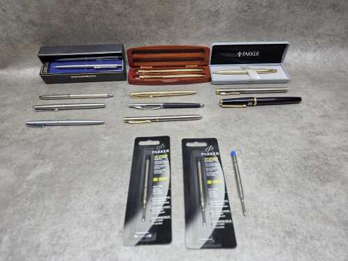 Mainly ballpoint pens, including Parker