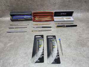 Mainly ballpoint pens, including Parker