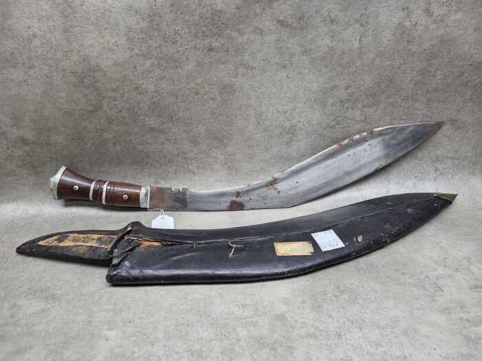 Traditional Gurkha Kukri knife with rosewood handle and leather scabbard