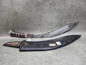 Traditional Gurkha Kukri knife with rosewood handle and leather scabbard
