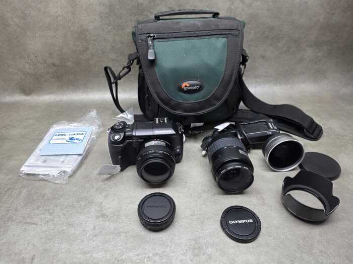 Olympus E-300 digital camera with two Olympus lenses