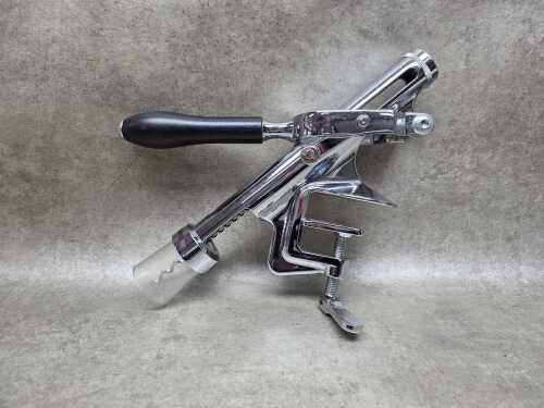 Wine bottle opener - table-mounted