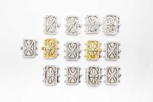 Thirteen multi strand clasps in sterling silver