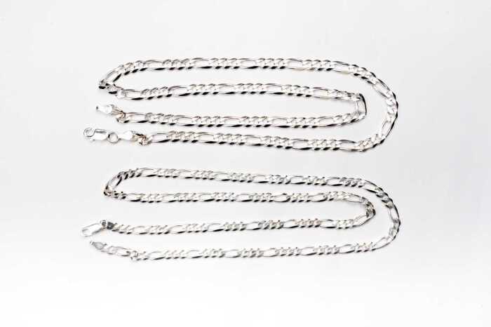 Two figaro link necklaces in sterling silver