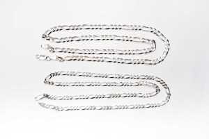 Two figaro link necklaces in sterling silver