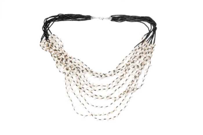 A ten strand freshwater pearl and black quartz necklace