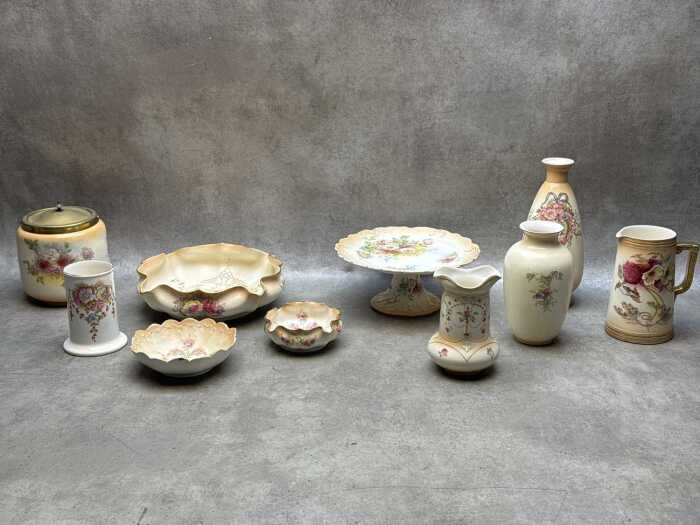 Antique English porcelain blush ware including footed cake plate, ruffle-edged dishes, metal lidded biscuit barrel, etc.