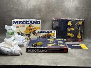 Three Meccano sets and assorted pieces