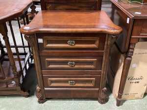 Carved three drawer bedside chest
