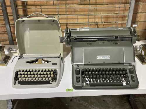 Two early typewriters, including Hermes Ambassador
